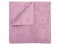 Ružový uterák zložený.