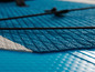 Textúra modrej nafukovacej paddleboard s bielym dielom.