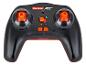 Čierny diaľkový ovládač Carrera RC s oranžovými tlačidlami a joystickmi.