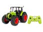 Diaľkovo ovládaný traktor Claas Arion 660 a diaľkový ovládač.