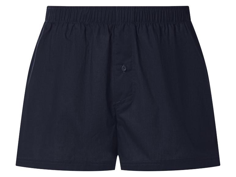 Tmavomodré pánske boxerky s elastickým pásom a zapínaním na gombíky.