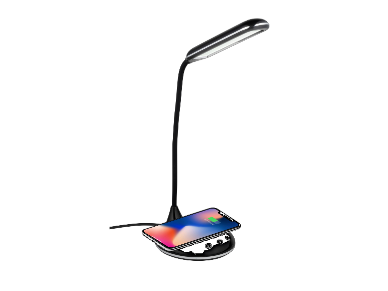 Moderná stolová lampa s bezdrôtovou nabíjačkou pre telefón.