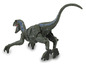 Hračka dinosaura v zelenej, modrej a sivej farbe.