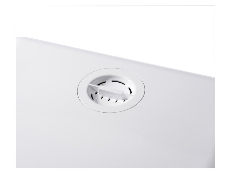 Biely plastový diel s okrúhlym vetracím otvorom.