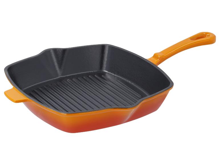 Oranžová smaltovaná liatinová panvica s grilom.
