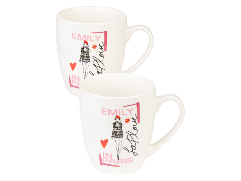 Dva biele hrnčeky s potlačou ženy v Paríži.