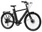 Čierny elektrický bicykel s pneumatikami Schwalbe.