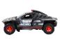 Model hračky čierneho rallyového auta Audi e-tron.