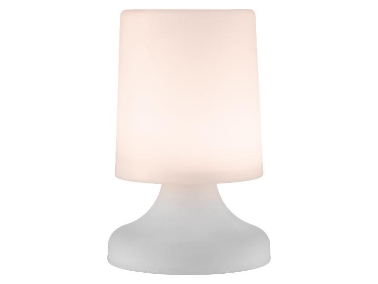 Biela stolová lampa so svietiacim valcovým tienidlom a zaoblenou základňou.