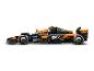 Pretekárske auto McLaren Formula 1 z kociek, s logami Chrome a Dropbox.
