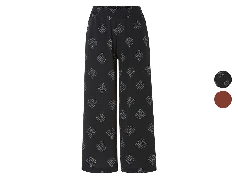 Široké nohavice s listovým vzorom, v čiernej a hnedej farbe.