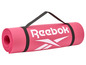 Ružová jógová podložka Reebok s popruhom na nosenie.