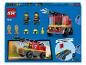 LEGO City Hasičské auto (60463) s dvoma minifigúrkami, hasičskými doplnkami a návodom na stavbu.
