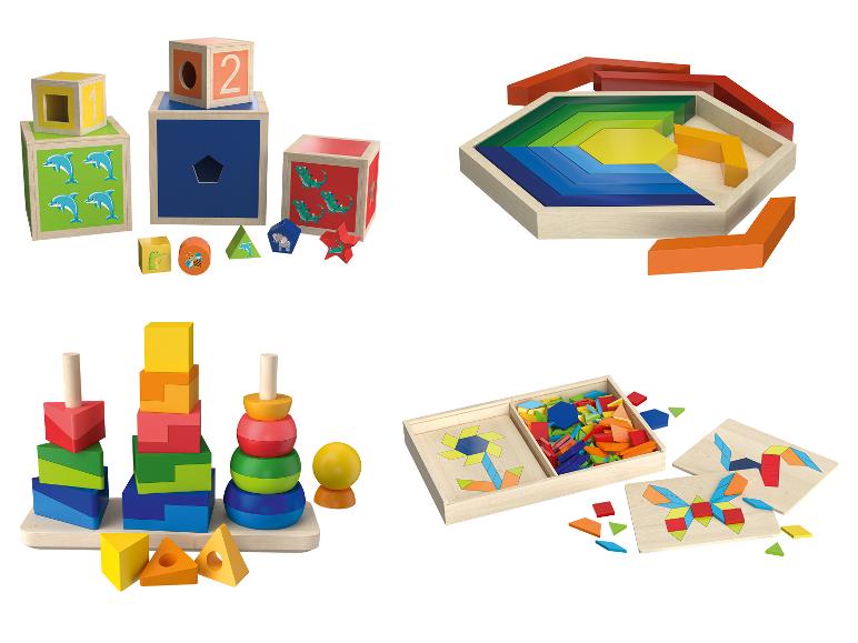 Drevené hračky pre deti: stohovacie kocky, tvarové puzzle a stohovacie krúžky.