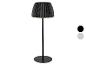 Čierna plisovaná stolová lampa s okrúhlou základňou, zobrazená s farebnými možnosťami.