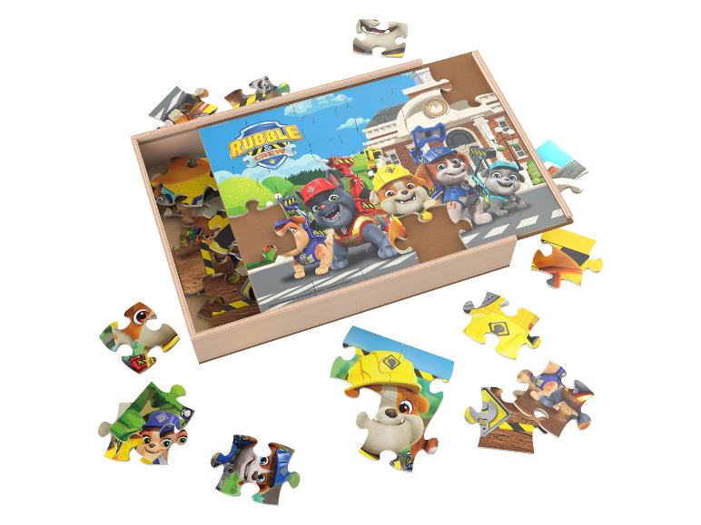 Drevené puzzle so šteniatkami a textom „Rubble & Crew“ v drevenej krabici.