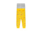 Žlté nohavice s potlačou domčekov.