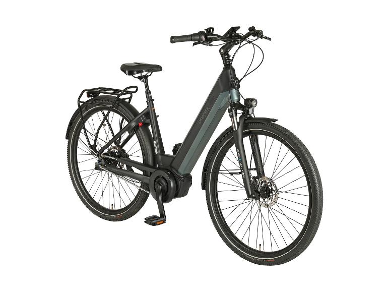 Čierny a sivý mestský elektrobicykel s nosičom batožiny a osvetlením.