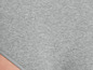 Detail sivej, rebrovanej spodnej bielizne.