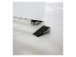 Dve čierne dverné zarážky so striebornými detailmi na svetlej dlažbe, jedna drží biele dvere otvorené.