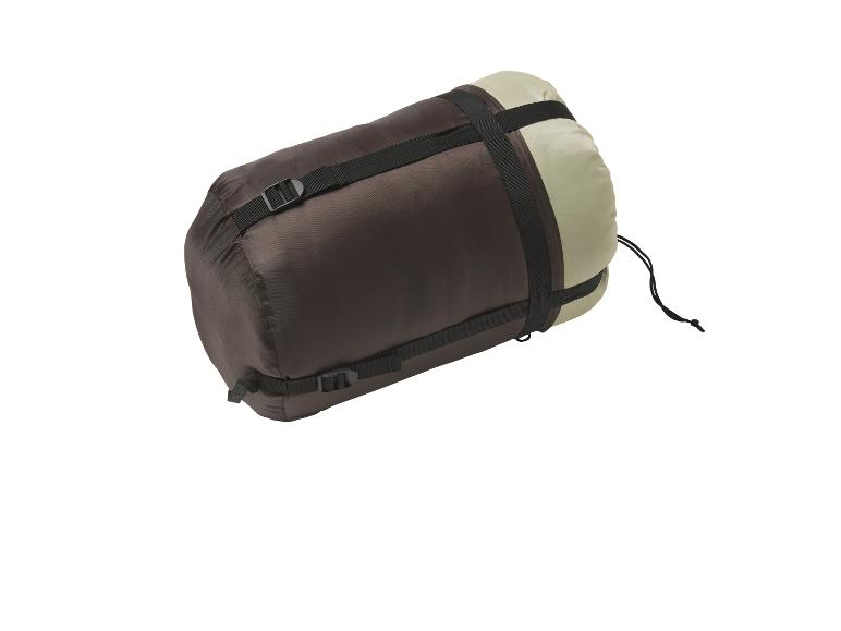 Zrolovaný hnedo-béžový spací vak s kompresnými popruhmi