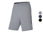 Športové šortky Under Armour v sivej farbe s čiernymi detailmi.