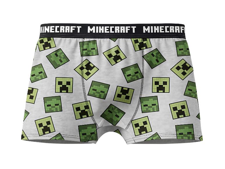 Chlapčenské boxerky so vzorom tvárí postáv z videohier a pásom s textom.