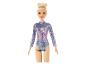 Barbie bábika v trblietavom gymnastickom obleku.