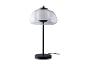 Čierna stolová lampa s mliečnym tienidlom.
