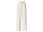 Dámske široké nohavice v krémovej farbe s elastickým pásom a šnúrkou.