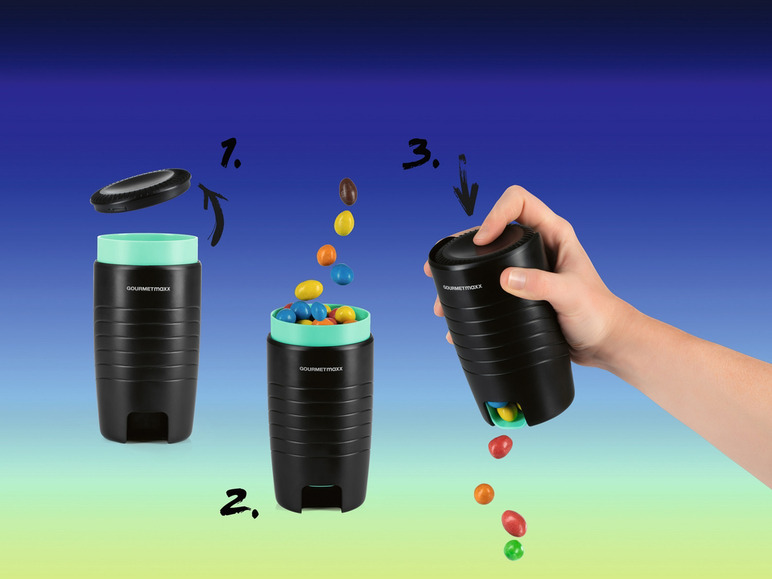Dispenser na sladkosti Gourmetmaxx s farebnými cukríkmi, ktoré padajú von.