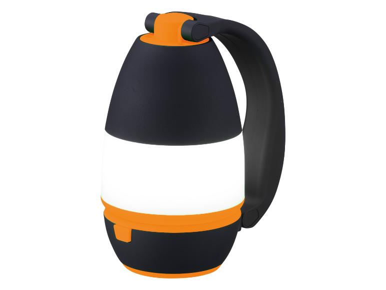 Čierna a oranžová kempingová lampa s rukoväťou.