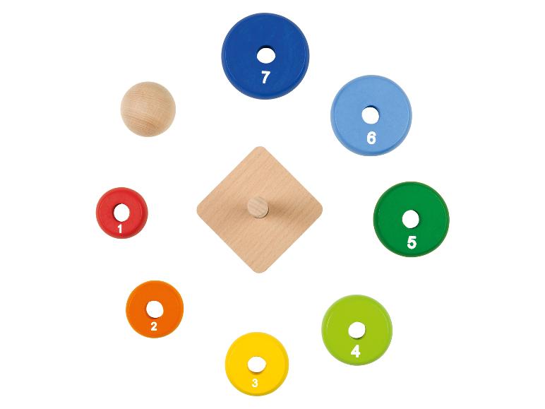 Drevená vzdelávacia hračka s farebnými krúžkami a číslami.