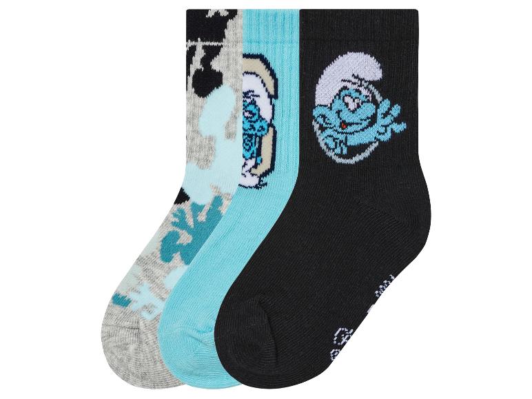 Tri páry ponožiek s motívom Smurfov.