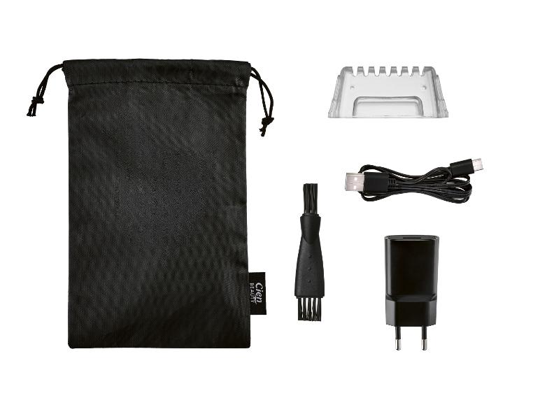 Súprava na osobnú starostlivosť s vreckom, hrebeňom, kefou, USB káblom a napájacím adaptérom.
