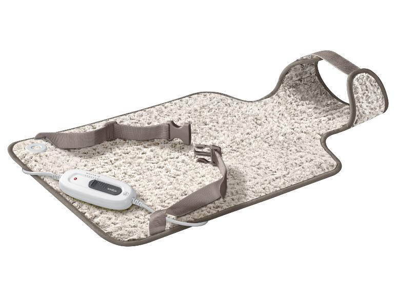 Biely, nadýchaný elektrický deka s diaľkovým ovládaním Sanitas a upevňovacími popruhmi.