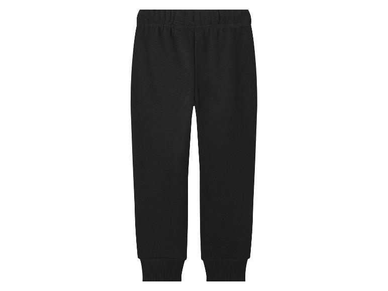 Čierne detské tepláky s elastickým pásom a manžetami.