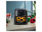 Čierna Philips Airfryer s technológiou RapidAir na kuchynskej linke s ​​zeleninou.