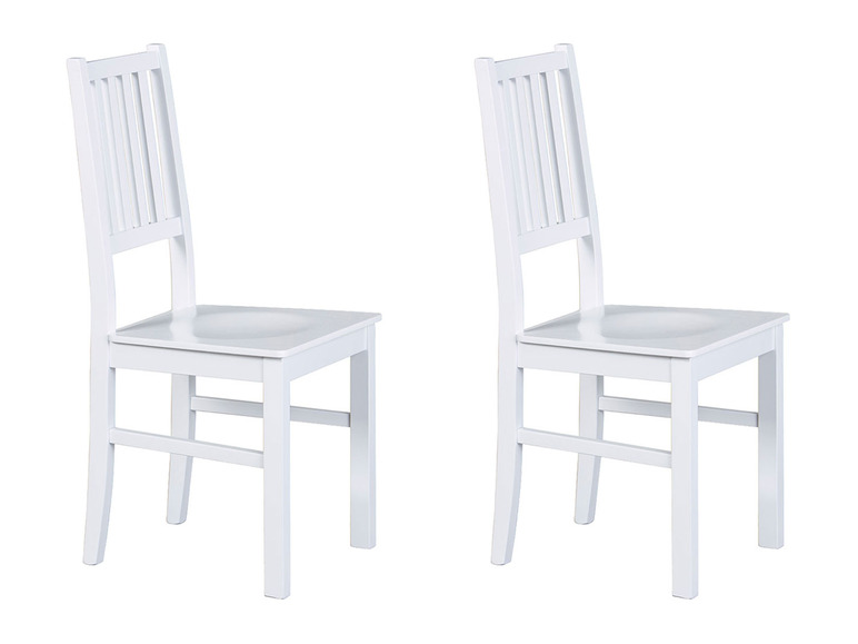 Dve biele drevené jedálne stoličky