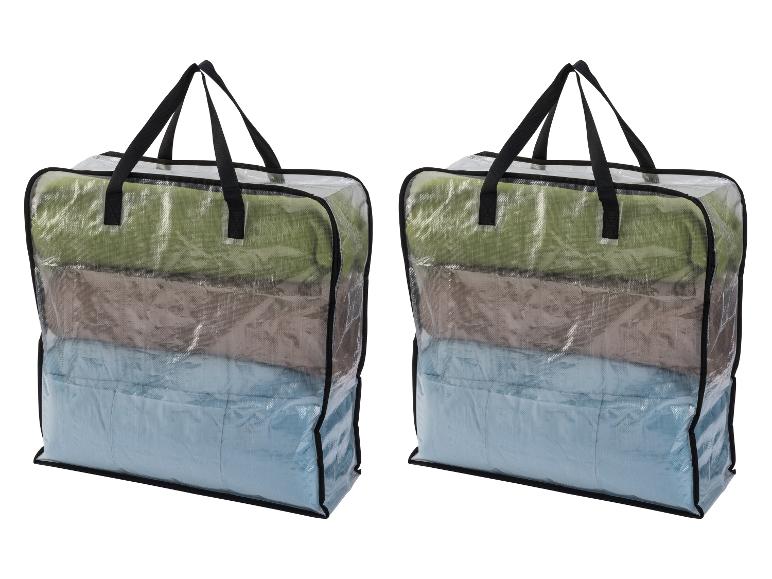 Dve priehľadné úložné tašky so zloženými zelenými, hnedými a modrými prikrývkami.