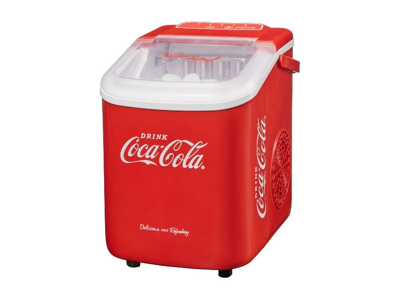 Červený automat na výrobu ľadu s logom Coca-Cola.