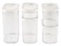 Sada štyroch priehľadných nádob na uskladnenie s bielymi viečkami.