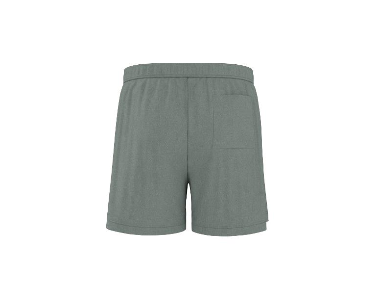 Pánske športové šortky v sivej farbe s elastickým pásom a zadným vreckom.