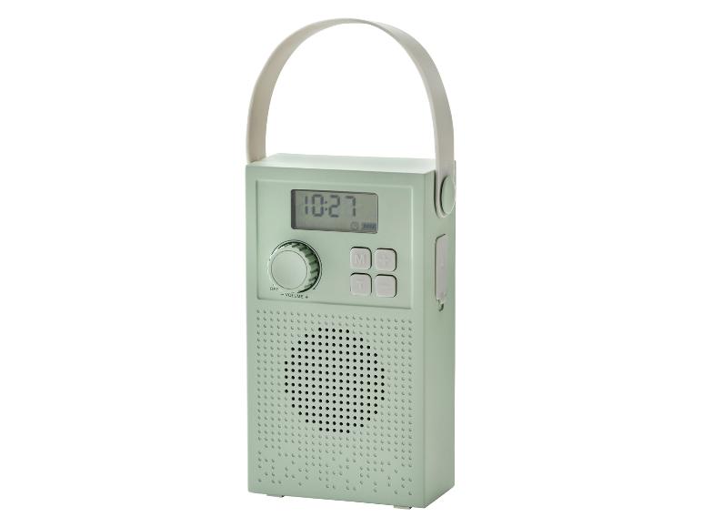 Prenosné rádio v mätovo zelenej farbe s digitálnym displejom a rukoväťou.