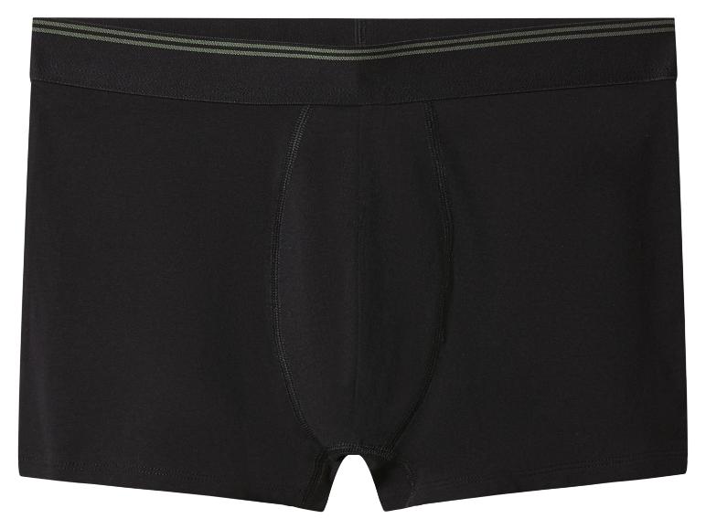 Čierne pánske boxerky so zelenými pruhmi na páse.