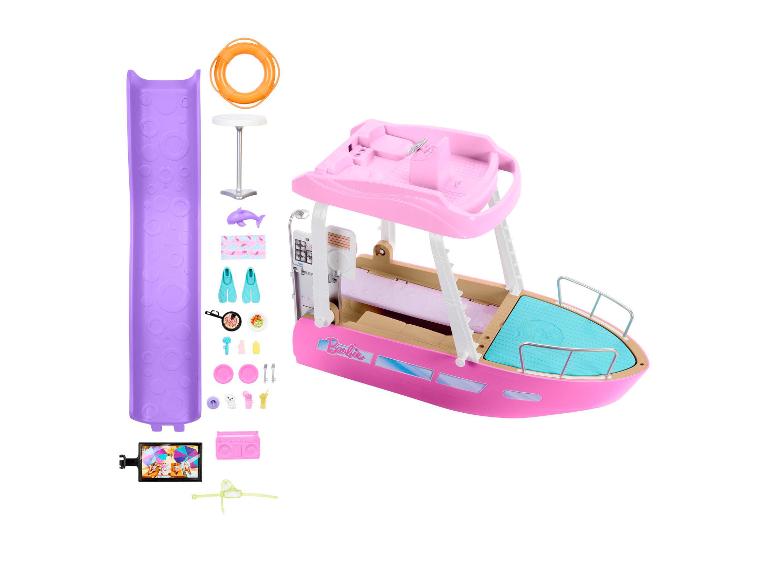 Barbie hracia súprava s ružovou loďou a plážovými doplnkami.