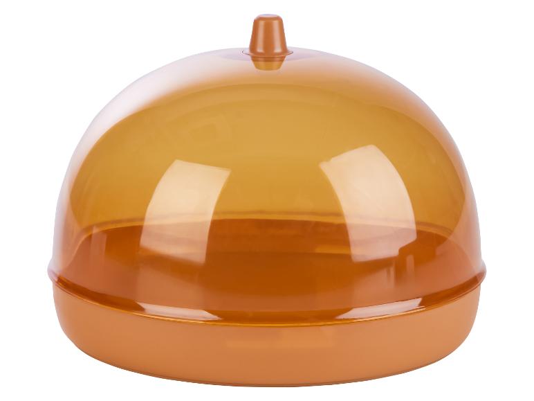 Plastová dóza s priehľadným vekom v oranžovej farbe.