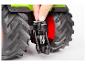 Zobrazený mechanizmus zadného závesu hračkarského traktora Fendt.