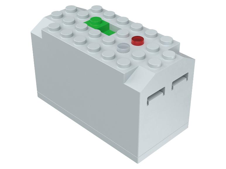 Sivá LEGO kocka so zeleným a červeným tlačidlom.