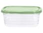 Priehľadná plastová nádoba so zeleným vekom na skladovanie potravín